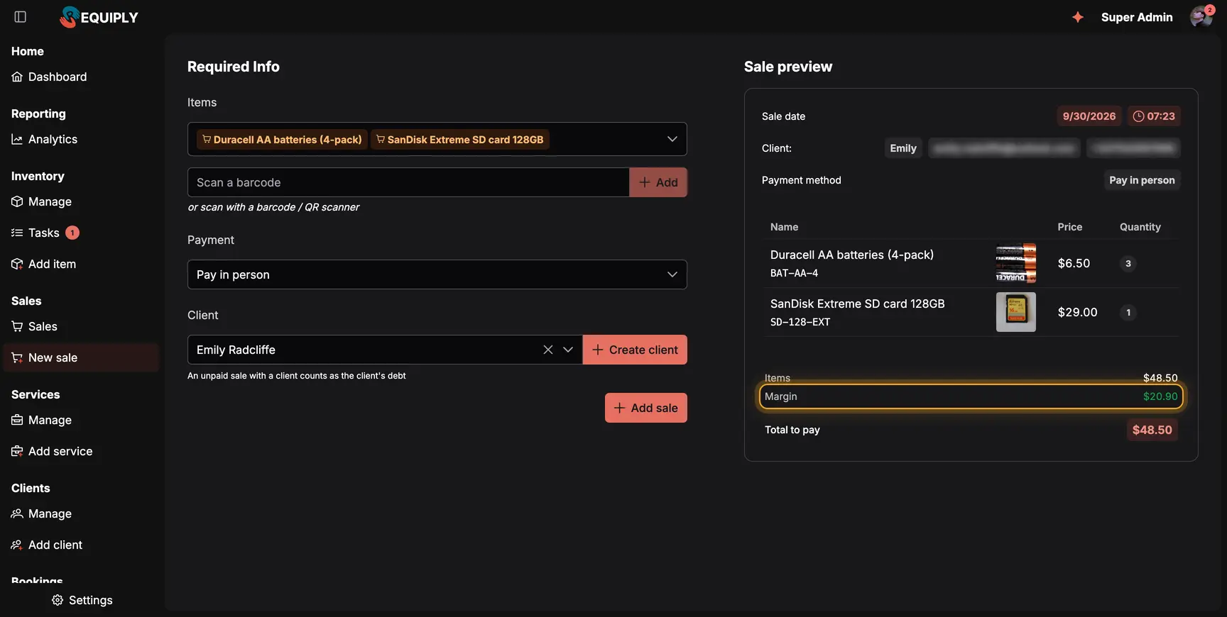 The New sale page: batteries and an SD card selected, a barcode scan field, pay in person, a client picked, and the Sale preview with the items, margin and total to pay