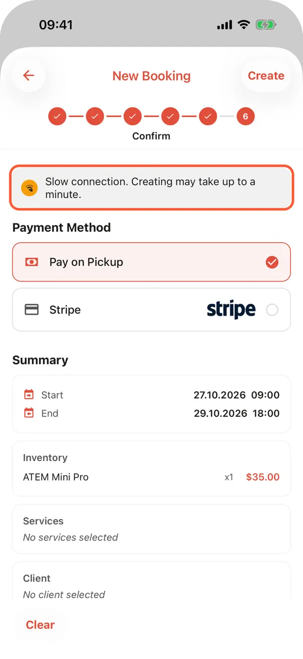 The Confirm step of a new booking on a weak connection with the notice Slow connection. Creating may take up to a minute
