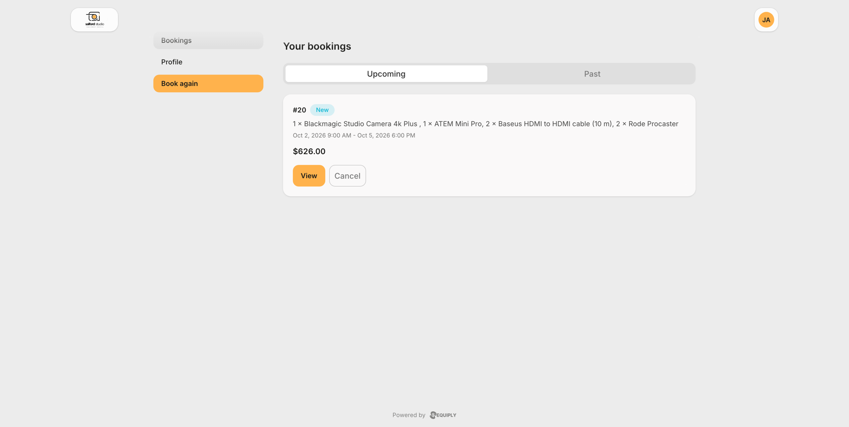 The Your bookings page of the portal in light mode for Stalford Studio. The side navigation lists Bookings and Profile with an orange Book again button. Under Upcoming, booking #20 carries a New pill, the items 1 × Blackmagic Studio Camera 4k Plus, 1 × ATEM Mini Pro, 2 × Baseus HDMI to HDMI cable (10 m) and 2 × Rode Procaster, the period Oct 2, 2026 9:00 AM to Oct 5, 2026 6:00 PM, the total $626.00, and View and Cancel buttons