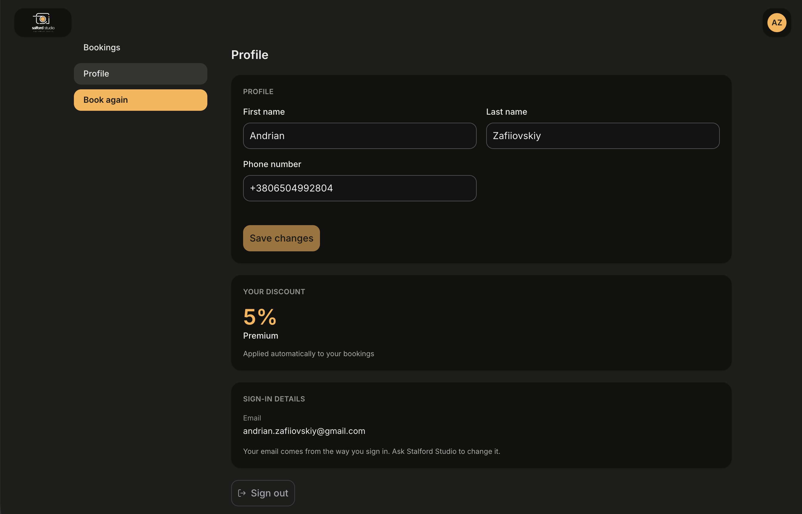 The Profile page of the portal account area in dark mode. A Profile card holds First name, Last name and Phone number fields with a Save changes button below them. A Your discount card shows 5 percent in large type with the discount name Premium under it and the line Applied automatically to your bookings. A Sign-in details card shows the email the account signs in with and the note that the email comes from the way the customer signs in and the organization can change it. A Sign out button sits at the bottom