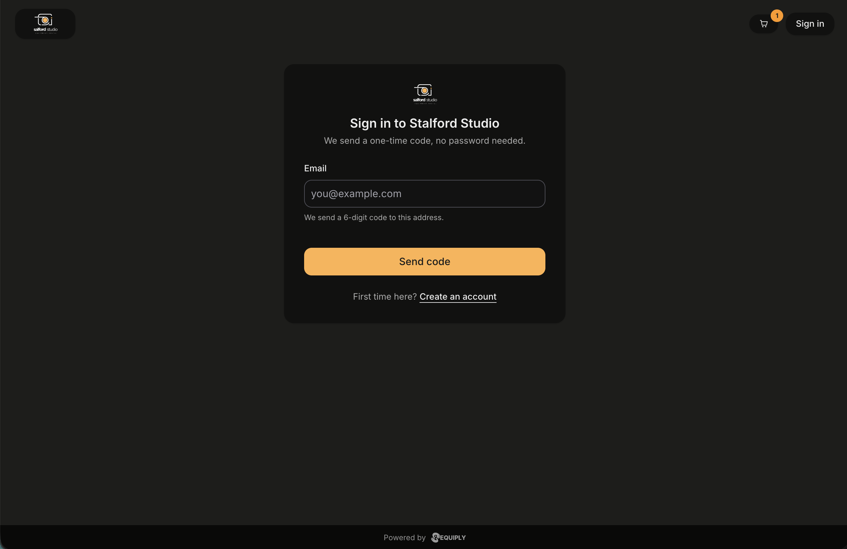 The portal sign-in page in dark mode. A Sign in button sits in the header next to the cart. In the middle of the page a card carries the organization logo, the heading Sign in to Stalford Studio, the line We send a one-time code, no password needed, an Email field with the placeholder you at example dot com and the hint We send a 6-digit code to this address, a full-width Send code button, and under it First time here? Create an account