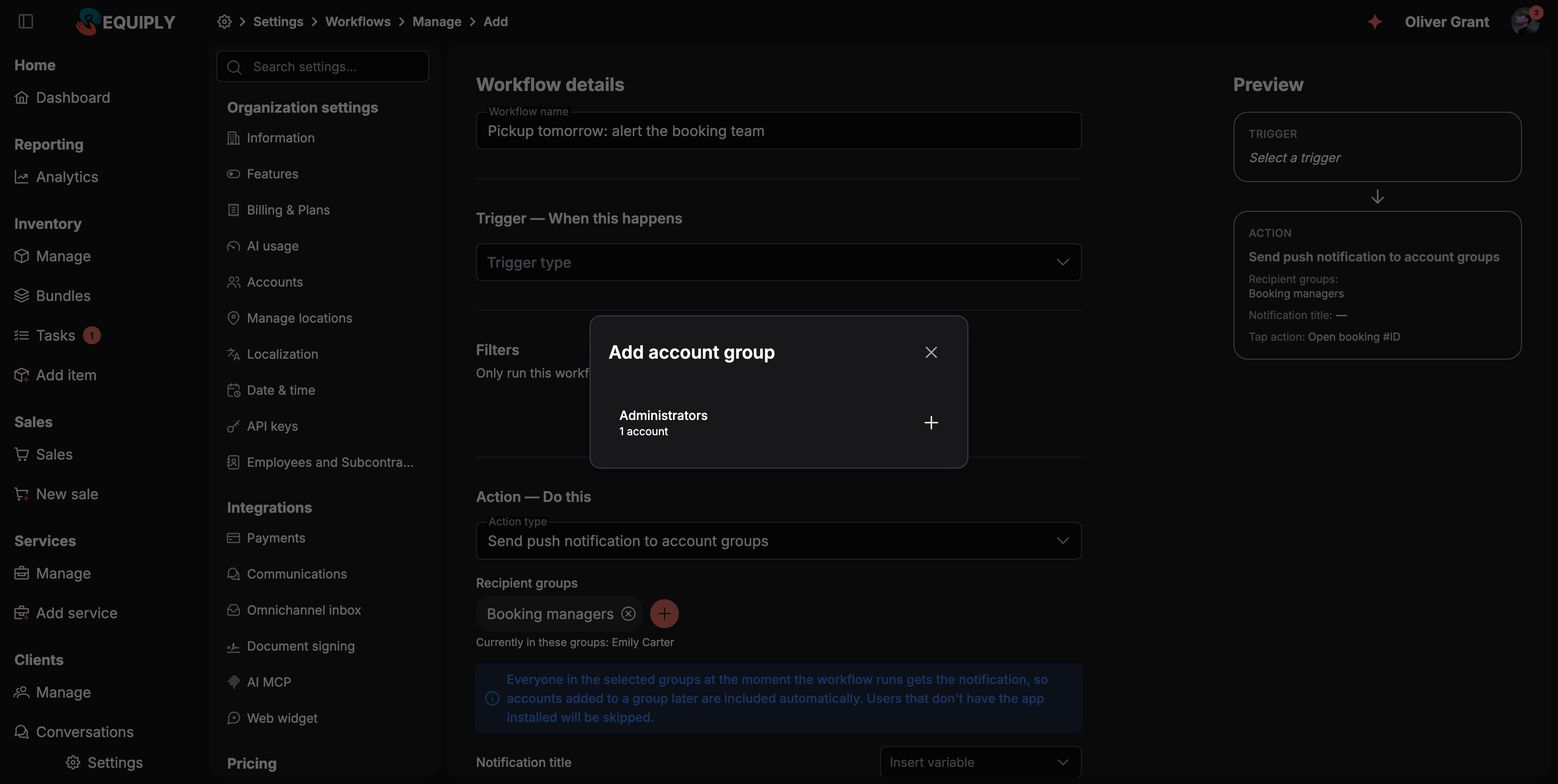 The Add workflow form named Pickup tomorrow: alert the booking team, with the action type Send push notification to account groups. Under Recipient groups, a Booking managers chip and a plus button, the line Currently in these groups: Emily Carter, and the info note about everyone in the groups at the moment the workflow runs. The Add account group dialog is open over the form and offers Administrators, 1 account. The Preview column shows the action with its recipient groups